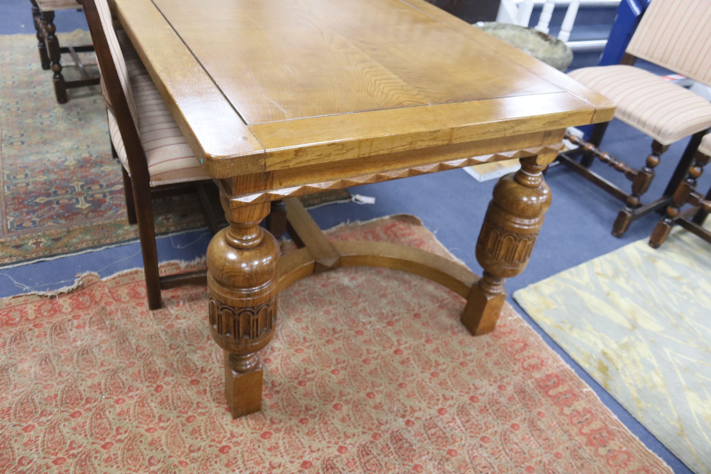 An 18th century style rectangular oak refectory dining table, length 182cm, depth 90cm, height 74cm